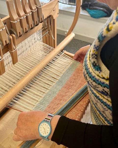 Fair Isle vests go very nicely with the weaving creations!