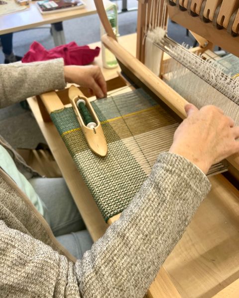 Weaving on our lovely table looms.