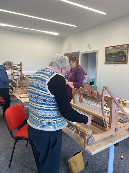 Weaving on the table looms.