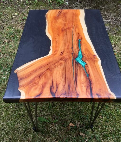 Beautiful yew slab coffee table with ocean green insert and finished with matt resin