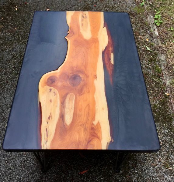 Yew slab coffee table finished in matt metallic resin either side