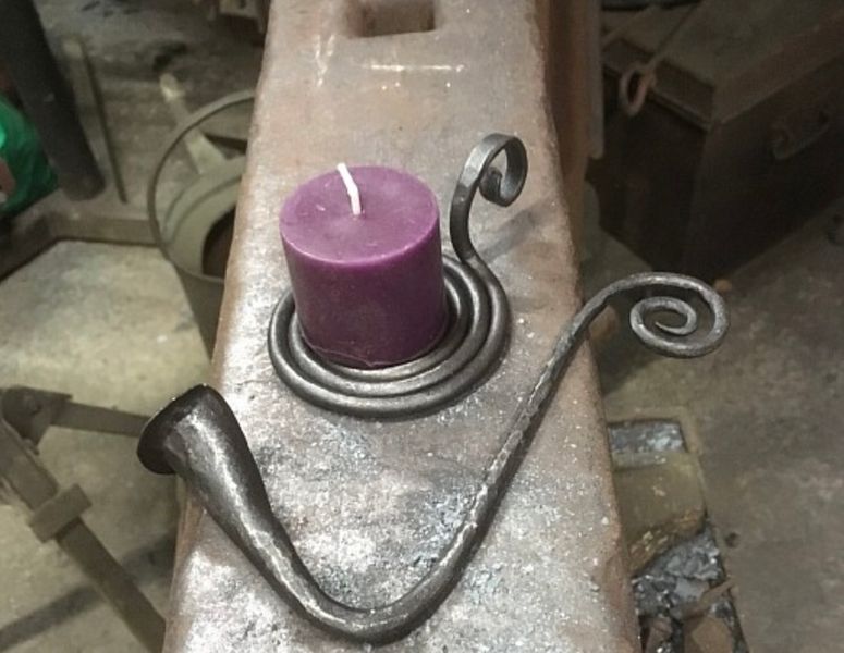 Made by a previous student... a beautiful forged candle holder