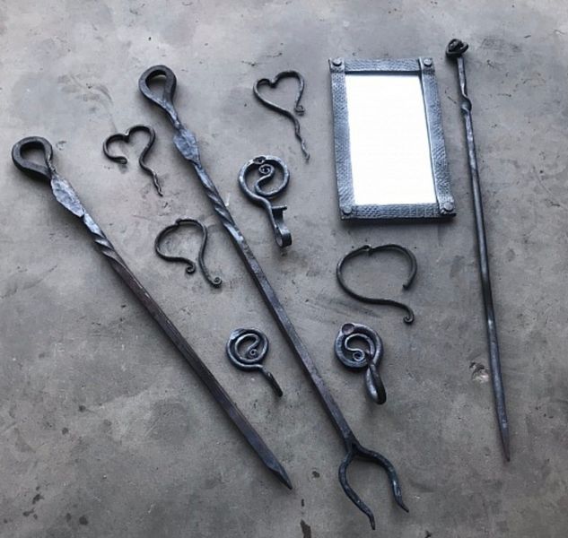 Made by a previous student... forged fire irons and tools