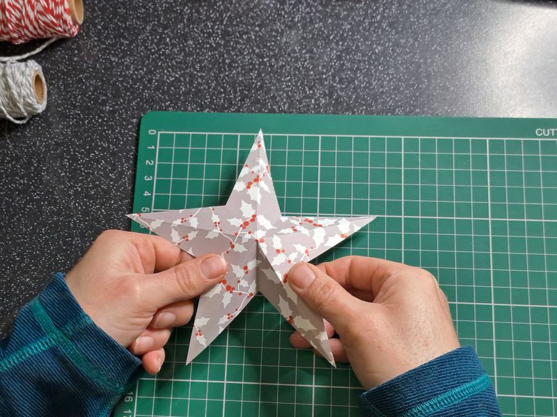 Student making star