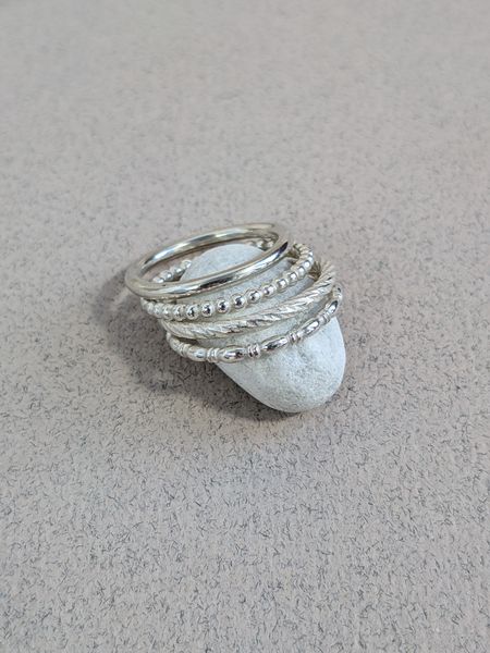 Silver stacking rings texture examples