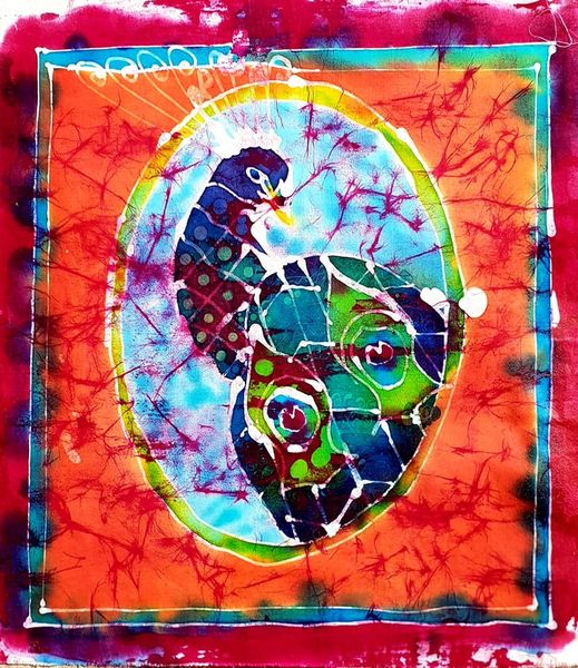The lovely colours of a peacock captured in this Batik work, made on the Batik workshop.