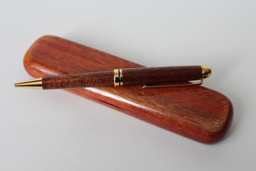 A reclaimed mahogany pen with a presentation case. 