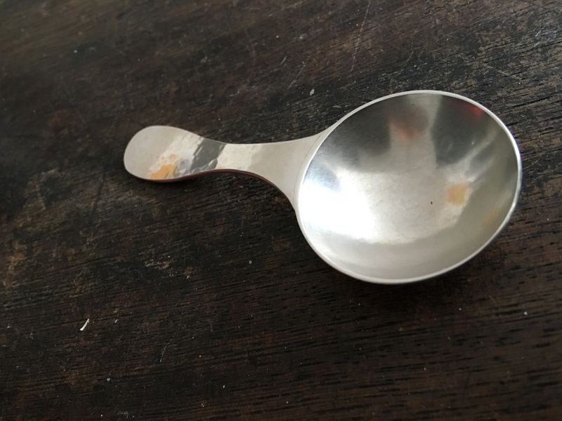 Silver fabricated spoon. Formed bowl attached to forged and shaped handle.