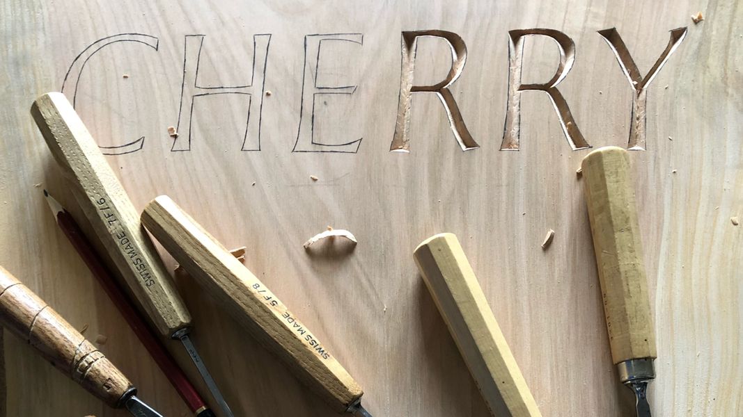 Letter carving in wood