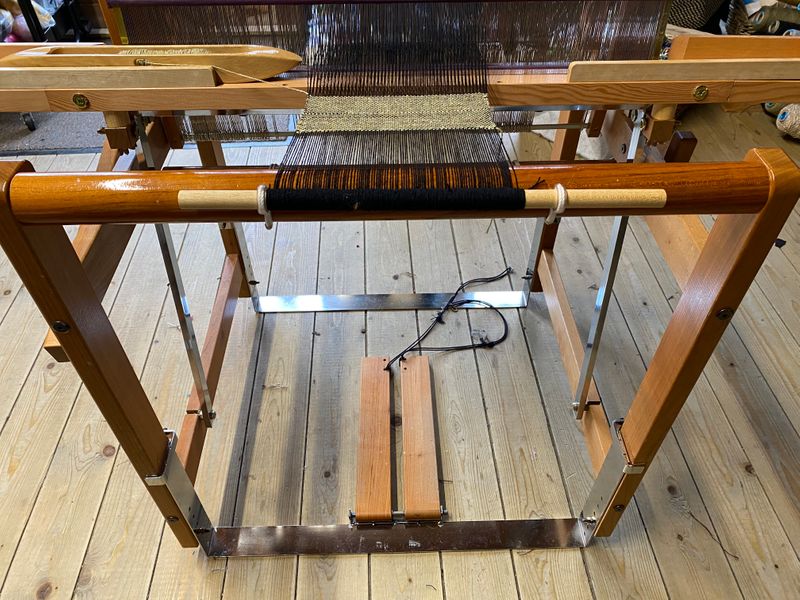 Adapted loom for weavers with limited mobility. 