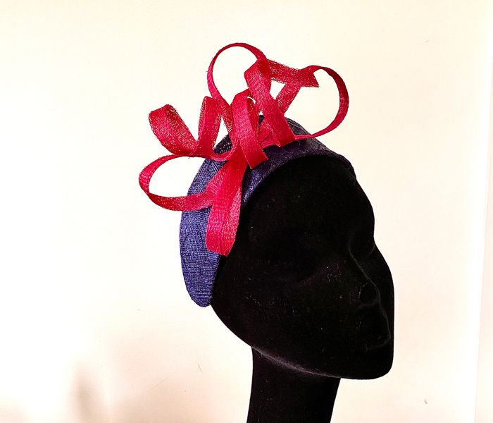 Contemporary halo sinamay headpiece with contrast twists and swirls - navy and viva magenta