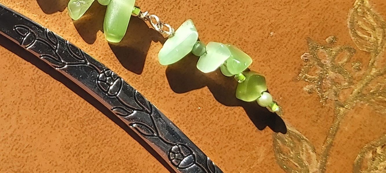 Aventurine Crystals added by hand one by one to the embossed bookmark
