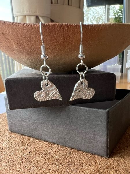 Embossed silver heart earrings