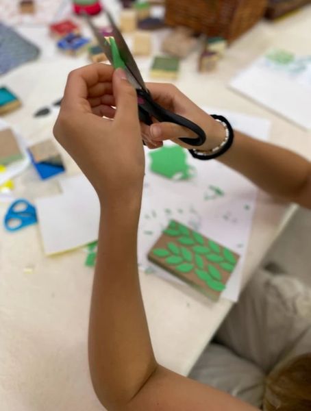 Block printing on children's summer craft day