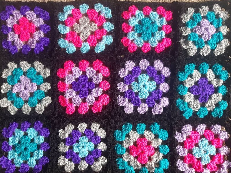 Granny squares in a flat piece. 