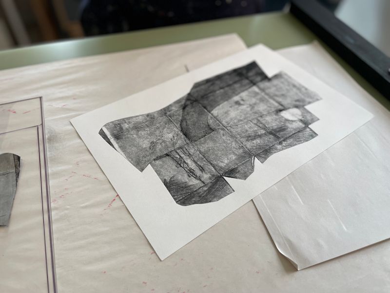Drypoint TetraPak Print, on the etching press, by a student from a recent course.