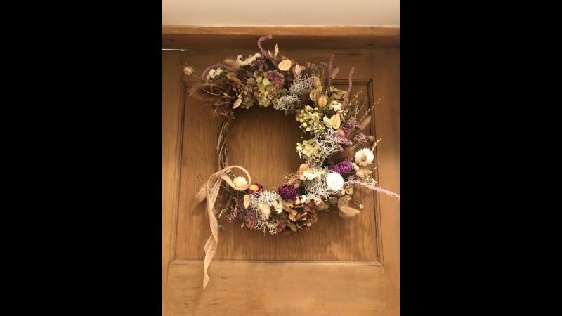 Dried wreath on door
