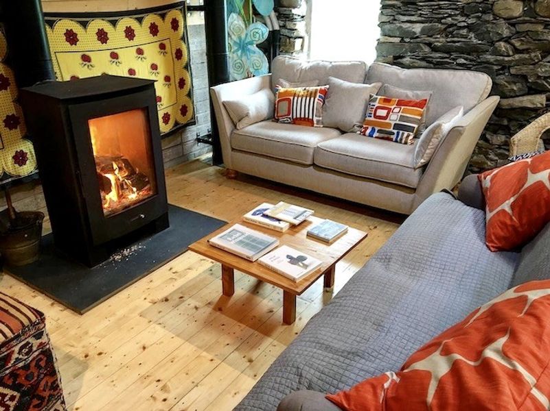 Cosy up to the fire and browse some art books or relax and chat