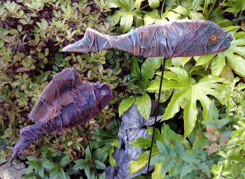 Fish garden sculpture These fish gently sway in the breeze on the fibre glass poles (supplied)