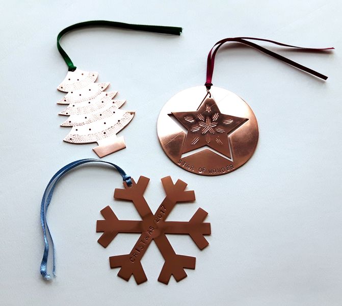 (DEMO) The Final Results: unique, hand pierced copper Christmas decorations.