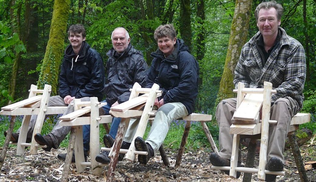 Course participants with their completed shave horses