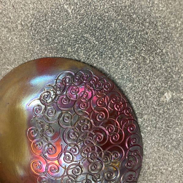 Flame coloured copper bowl
