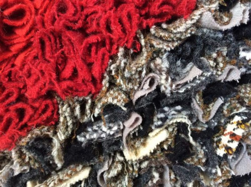 Detail of progged rag rug - recycled woollens