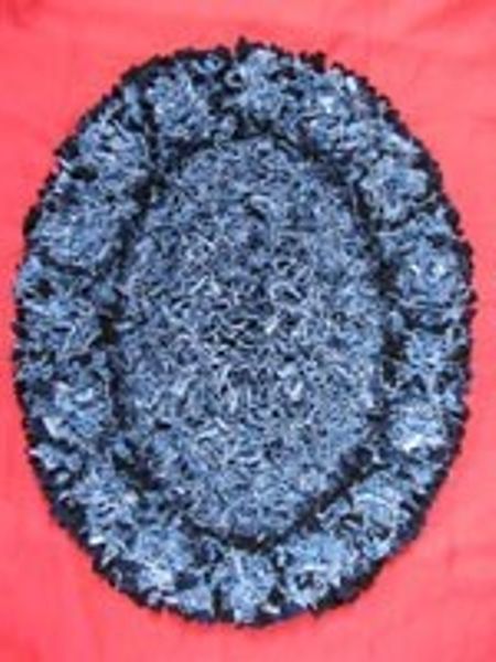 Kit to make a shaggy oval rag rug