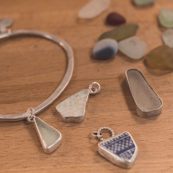A selection of bezel settings, using seaglass. There's plenty to choose from, we have tons in stock!