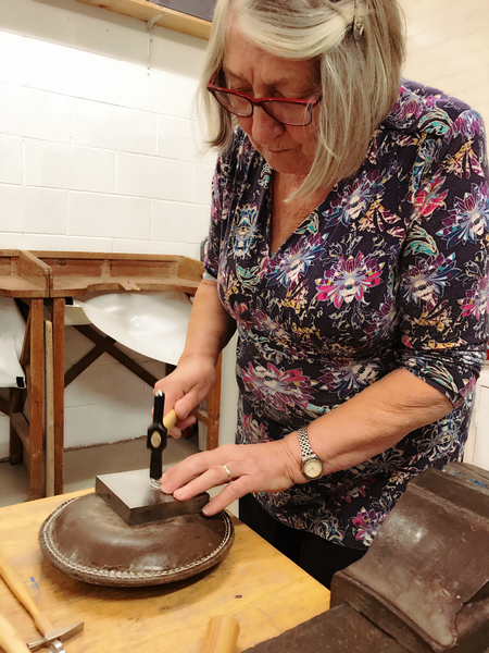 Student forging in silversmithing classroom Rachel Hearne