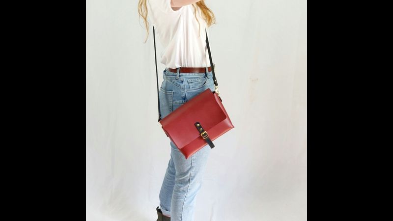 Red leather satchel on model approx 5'5