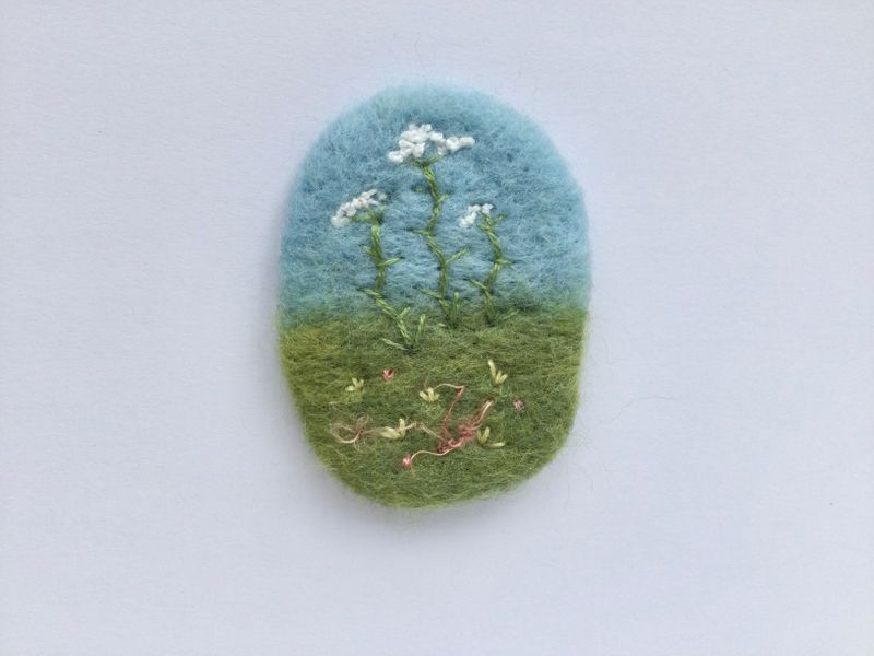 Needle felted brooch with embroidered wildflowers: c. Hobbz Designs