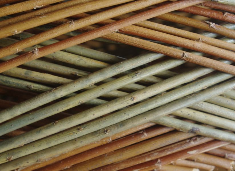 Criss cross weaving on the square based basket