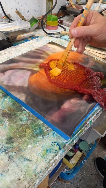 Creating texture on the photo-encaustic surface.
