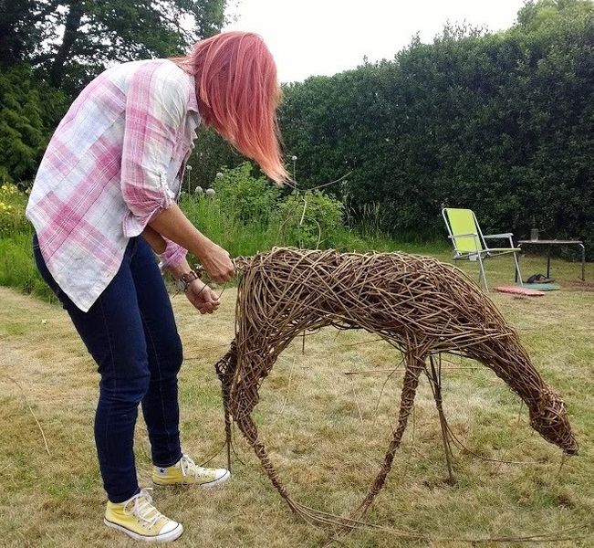 student working on her deer