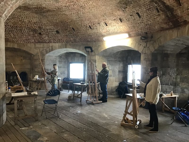 Painting portraits in the Round Tower, Old Portsmouth.