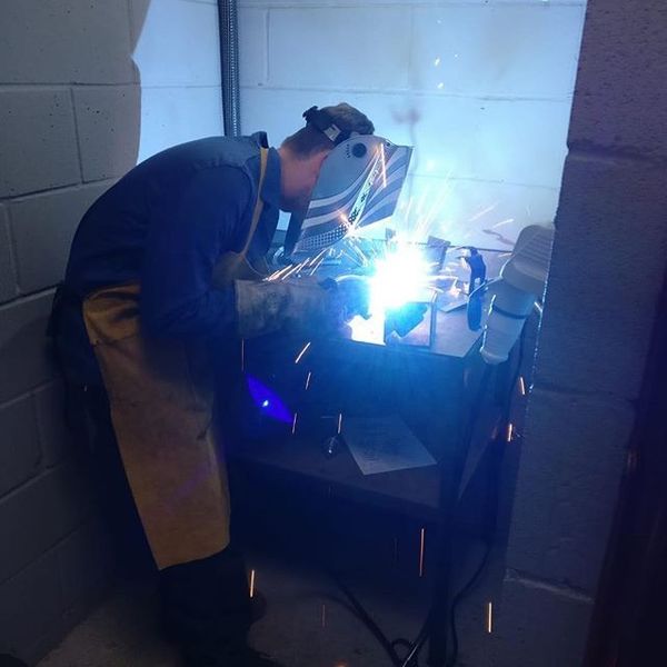 A student enjoying the MIG Welding Process with our high quality P.P.E provided.