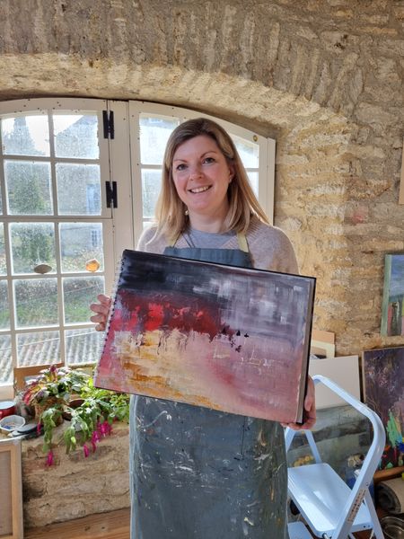Nicola with one of her paintings