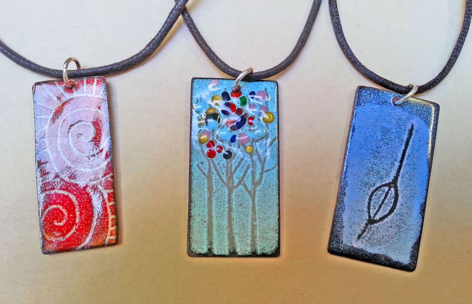 Three Pendants enamelled on copper by students