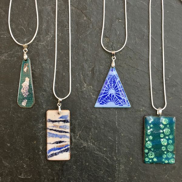 A collection of pendants made on the beginners day course, so many design possibilities!