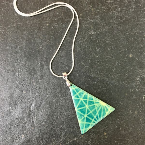 Triangular pendant, enamel on copper, made on the beginners day course at Rainbow Glass Studios