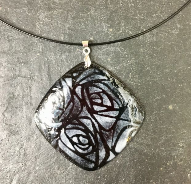 Enamel on copper pendant on a choker, ready to wear home after the course at Rainbow Glass Studios