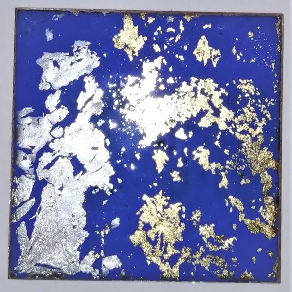 Silver and gold leaf on enamel