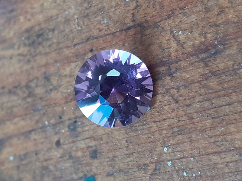 Amethyst round brilliant cut by Craig M. on his third lesson! Really good fun teaching this cut, a great job by a great student! :)