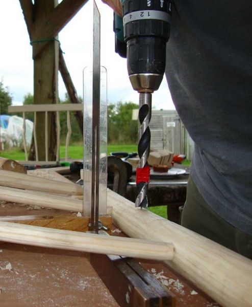 Drilling chair legs.