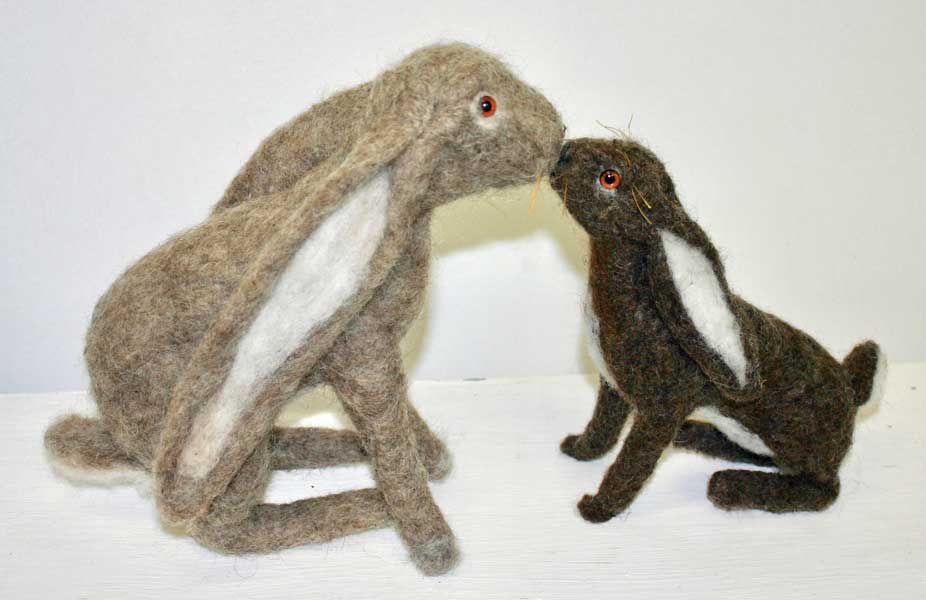 Two hares made by student in the workshop