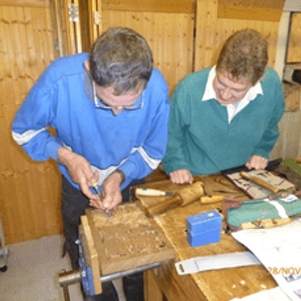 Carving a relief panel with Zoe Gertner teaching woodcarving in Cornwall