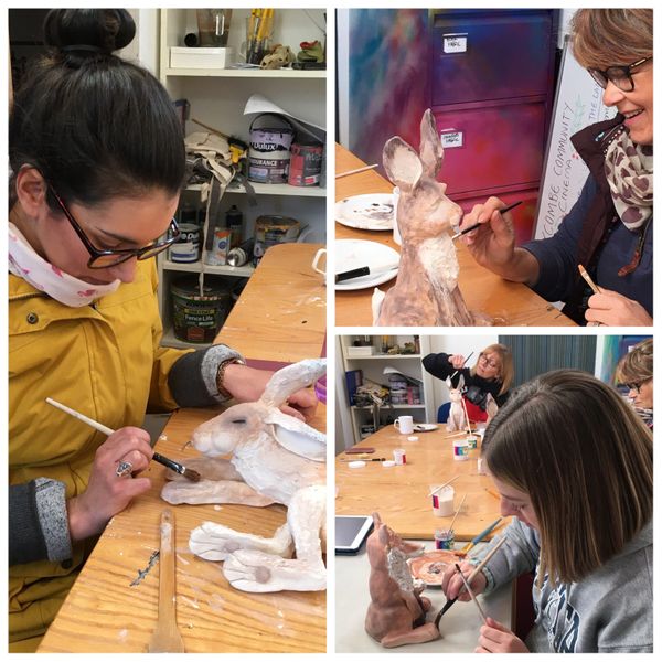 Students decorating their sculptures