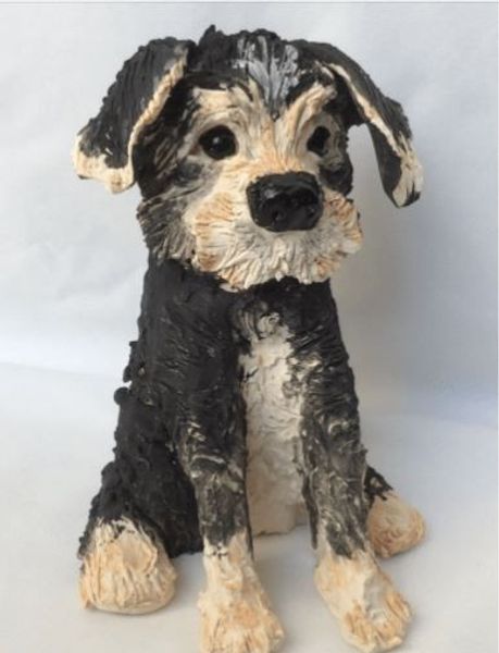 Dog clay sculpture