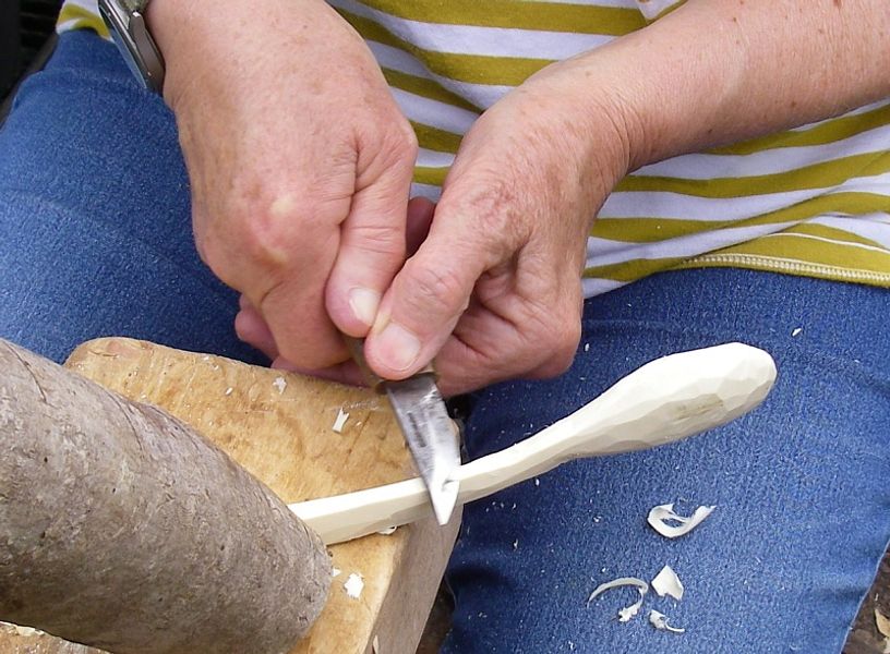 Shaping a spoon with a straight knife